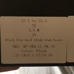 Over the knee black suede boots